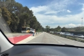 Un autobús de la línia C1 passa per la carretera B-124 dilluns al migdia