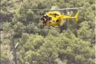 Una imatge de l'operació de gruatge del ferit al gorg del Diable